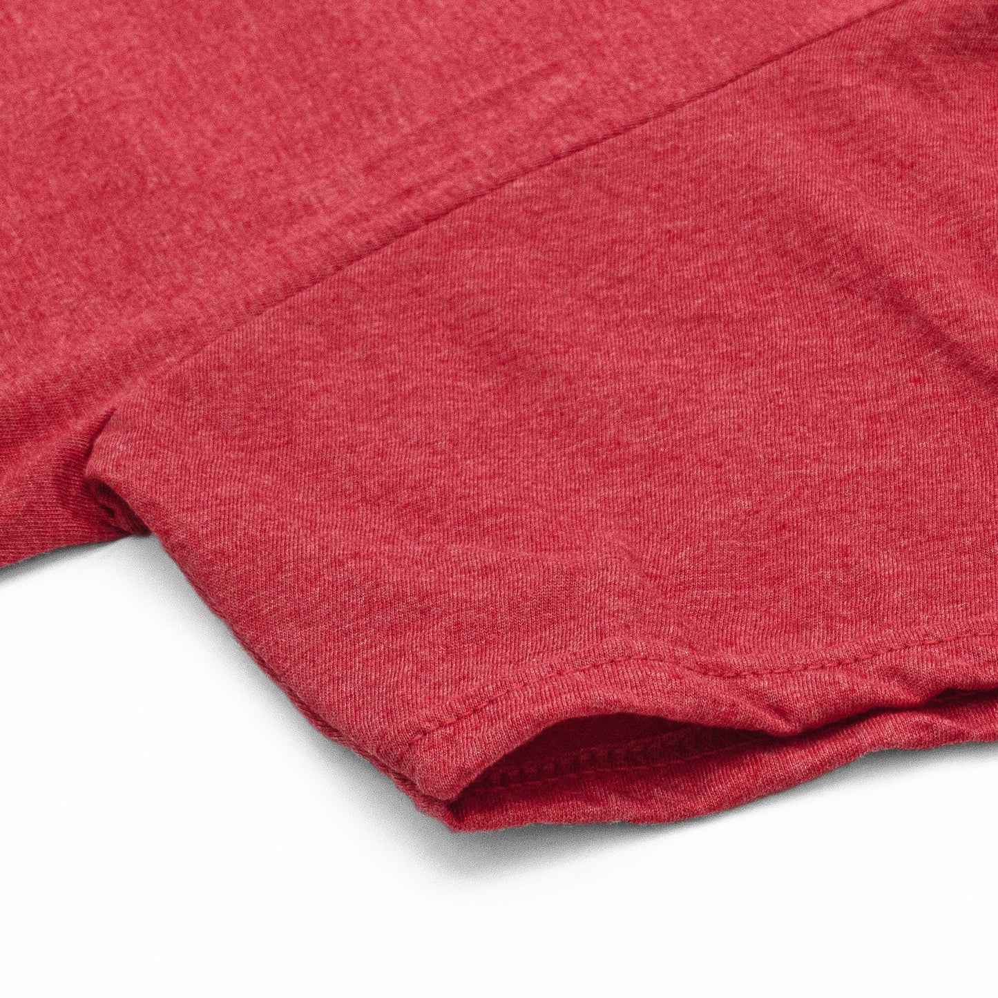 Close-up of a red fabric texture on a white background