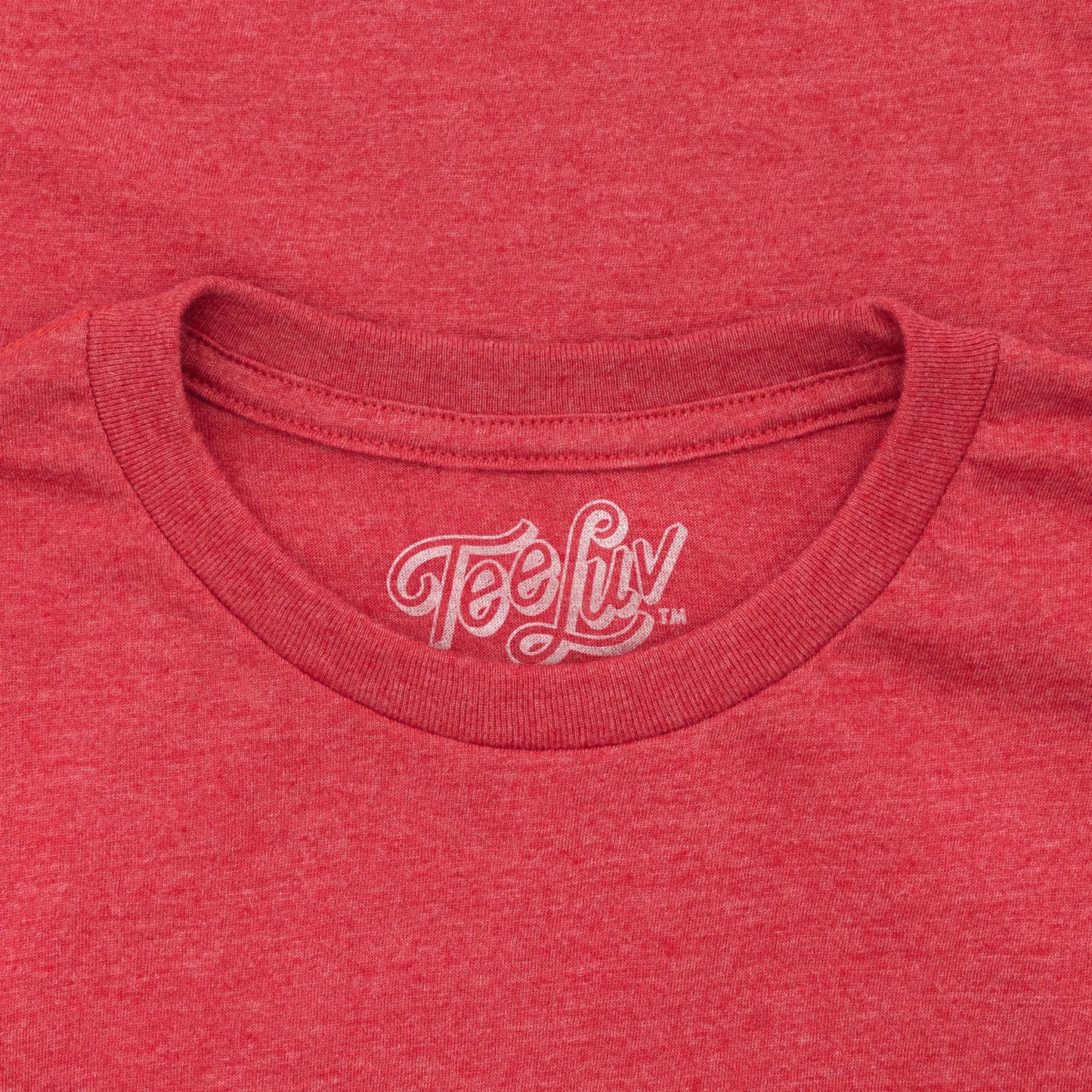 Red t-shirt with 'TeeLuv' logo on the collar