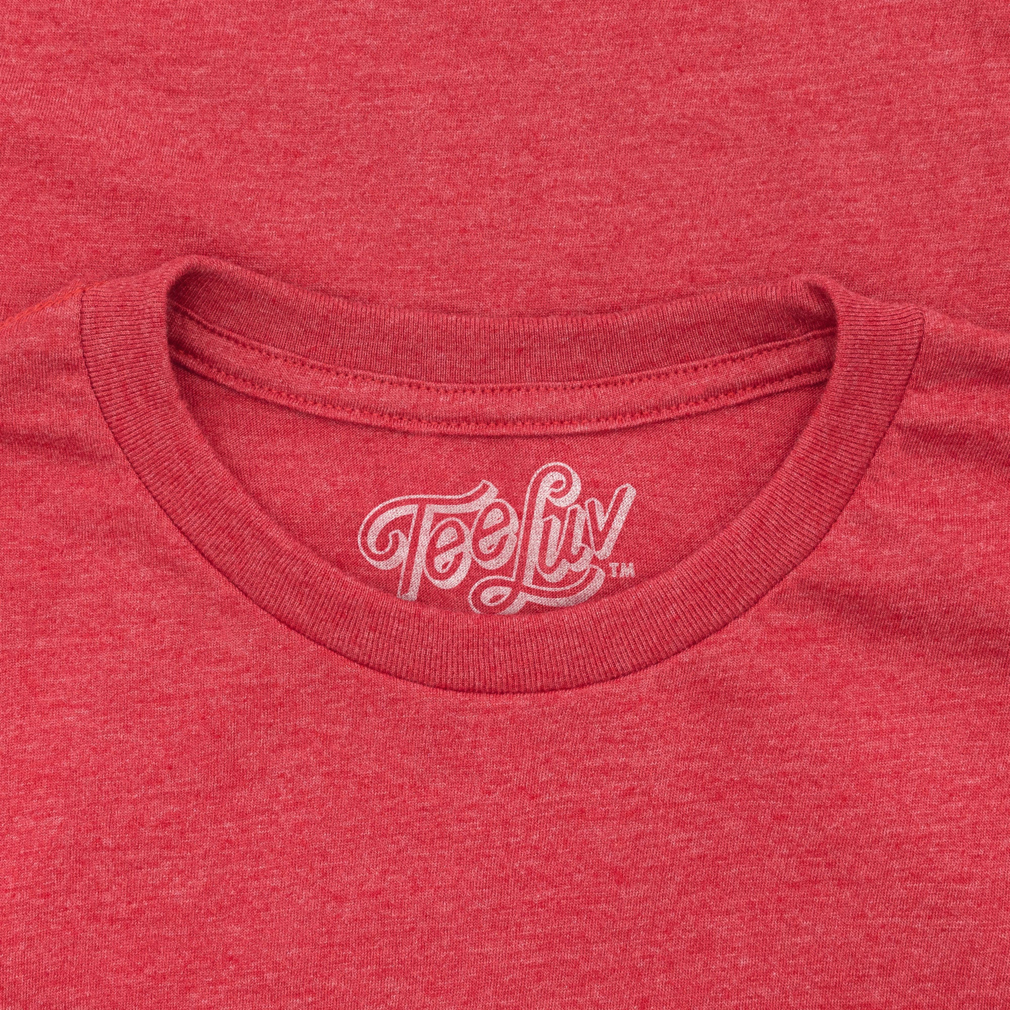 Red t-shirt with 'TeeLuv' logo on the collar