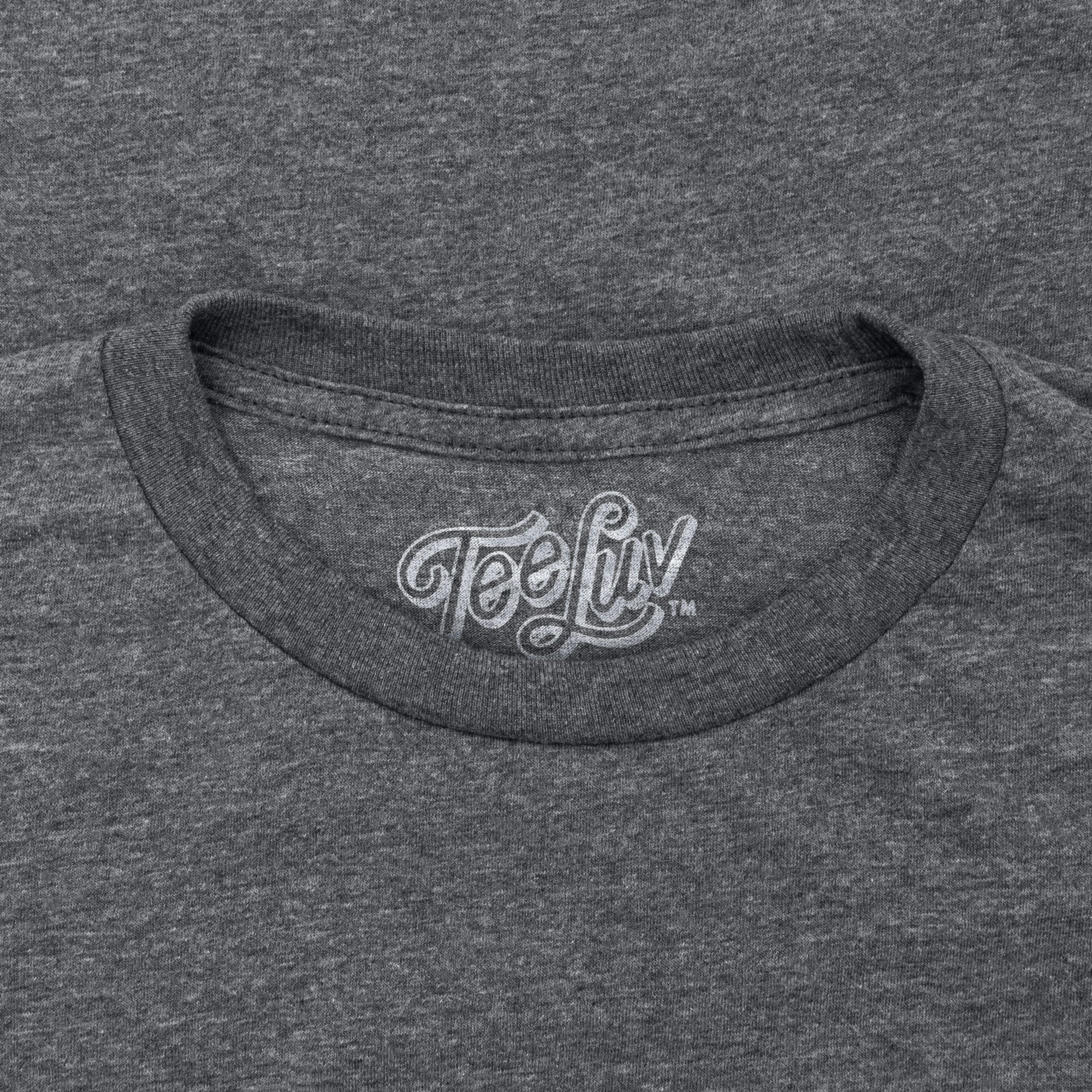 Gray t-shirt with 'Tee Liv' logo on the collar