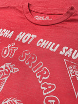 Red t-shirt with white text and graphics on a red background