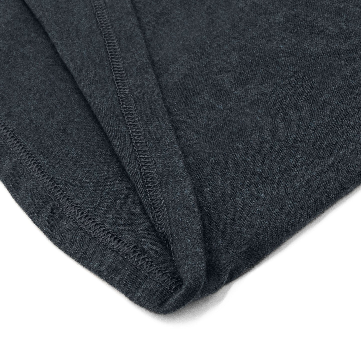 Close-up of dark gray fabric with a white background