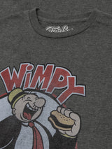 Gray t-shirt with a cartoon character holding a burger and the word 'Wimpy' on a dark background.