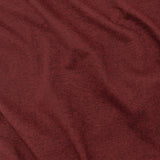 Close-up of dark red fabric with visible texture