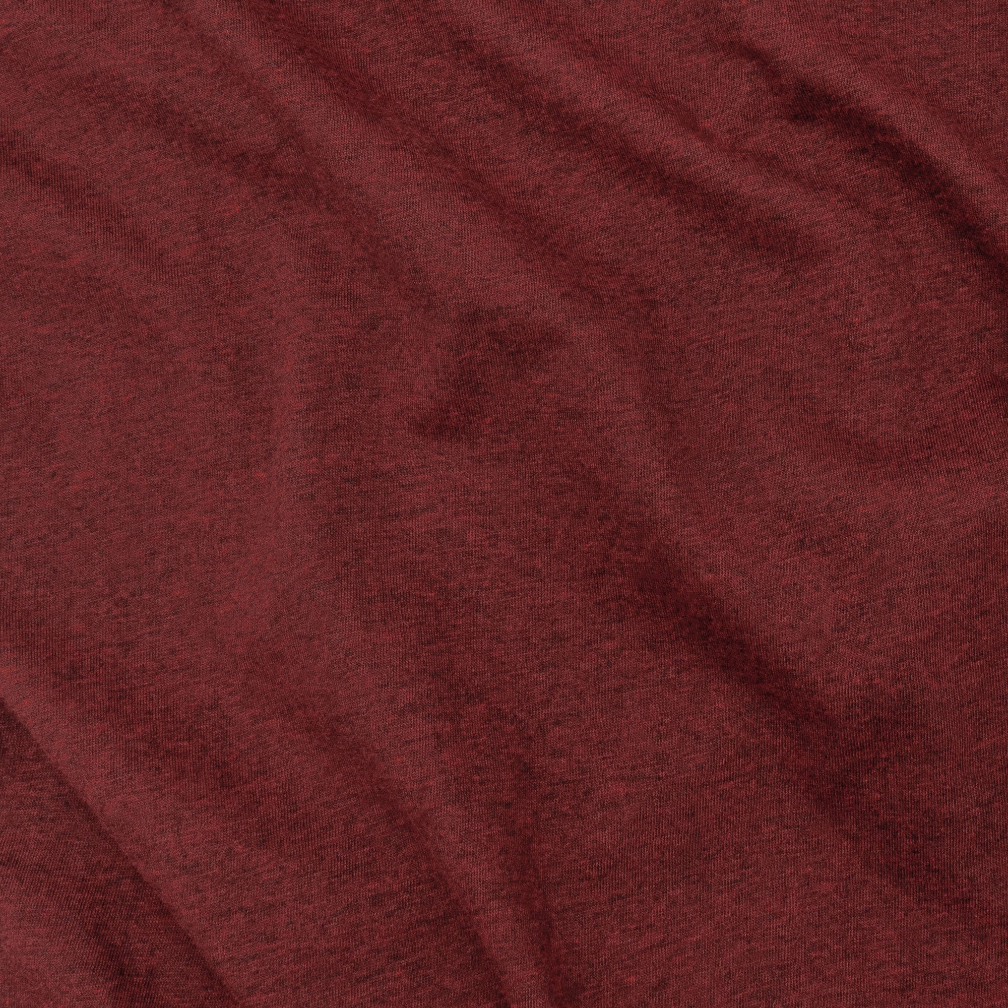 Close-up of dark red fabric with visible texture