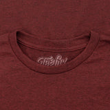 Close-up of a maroon t-shirt with 'Teefly' logo on the collar.