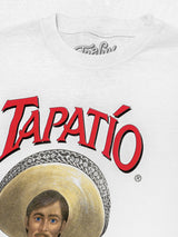 White t-shirt with Tapatio logo and face design on a white background