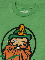 Green t-shirt with a graphic of a bearded man with a bird on his head and 'Folktale' branding.