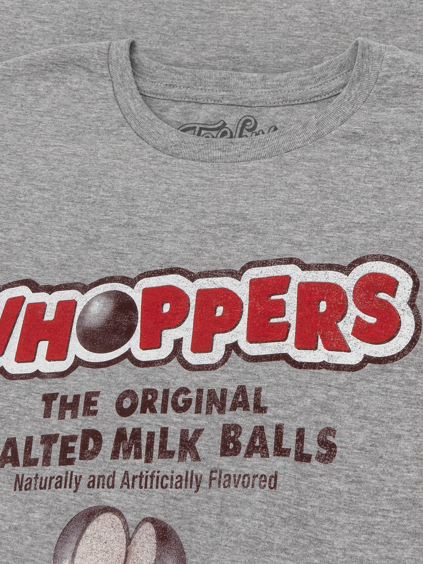 Gray t-shirt with Whoppers candy logo and text on a gray background
