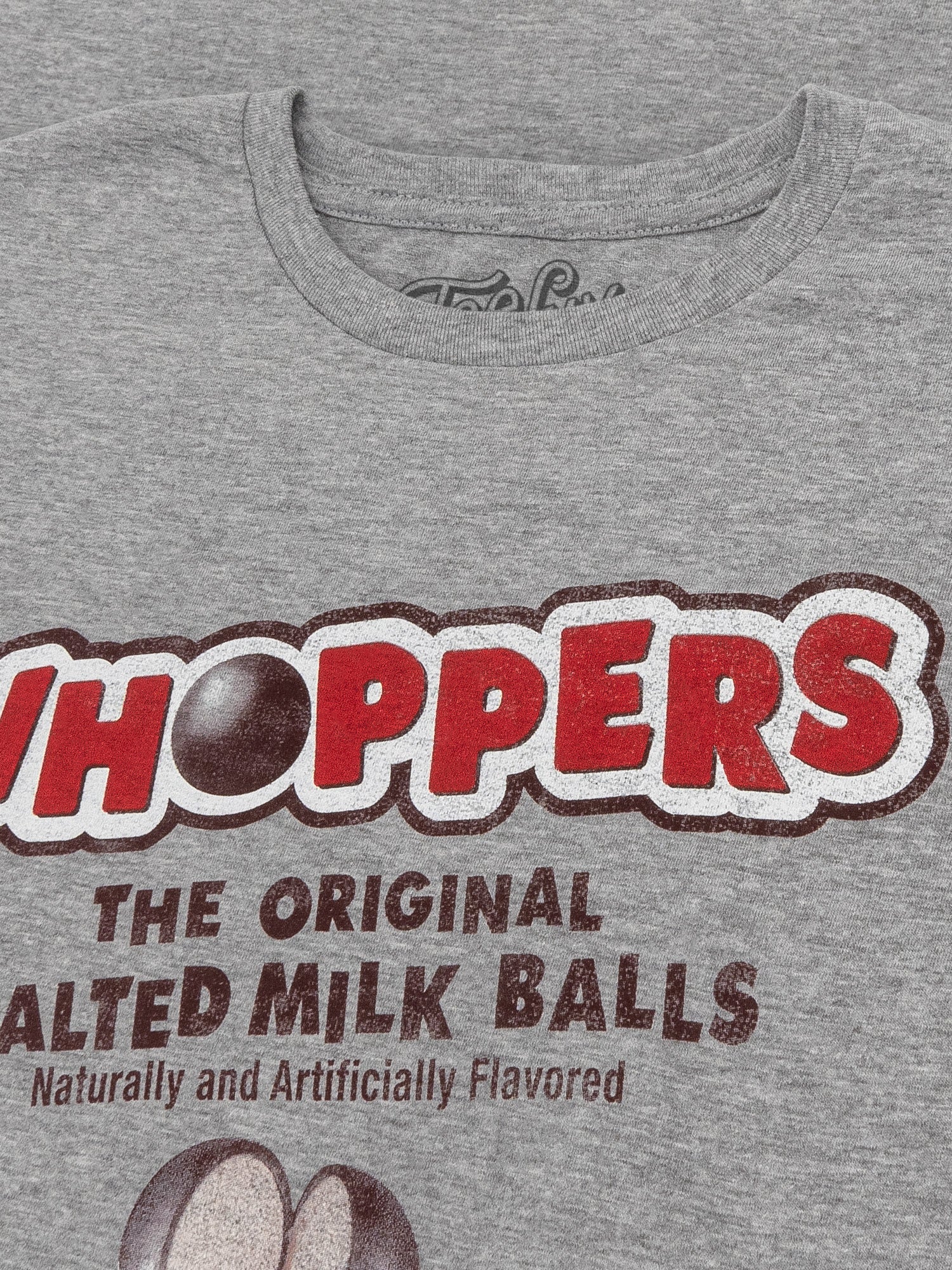 Gray t-shirt with Whoppers candy logo and text on a gray background