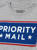 Gray t-shirt with 'Priority Mail' graphic and Teefly logo.