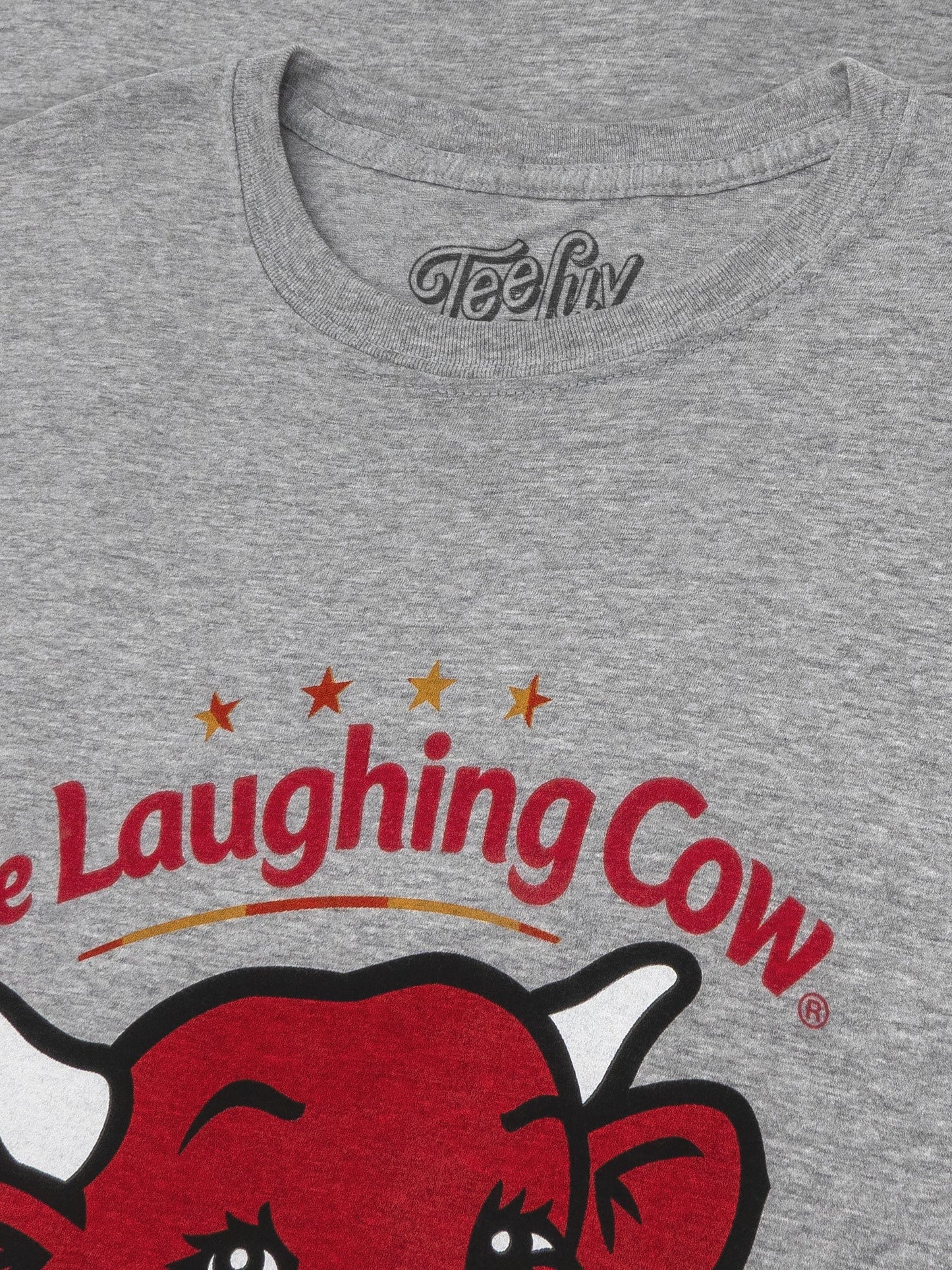 Gray t-shirt with 'Laughing Cow' logo and branding on a gray background