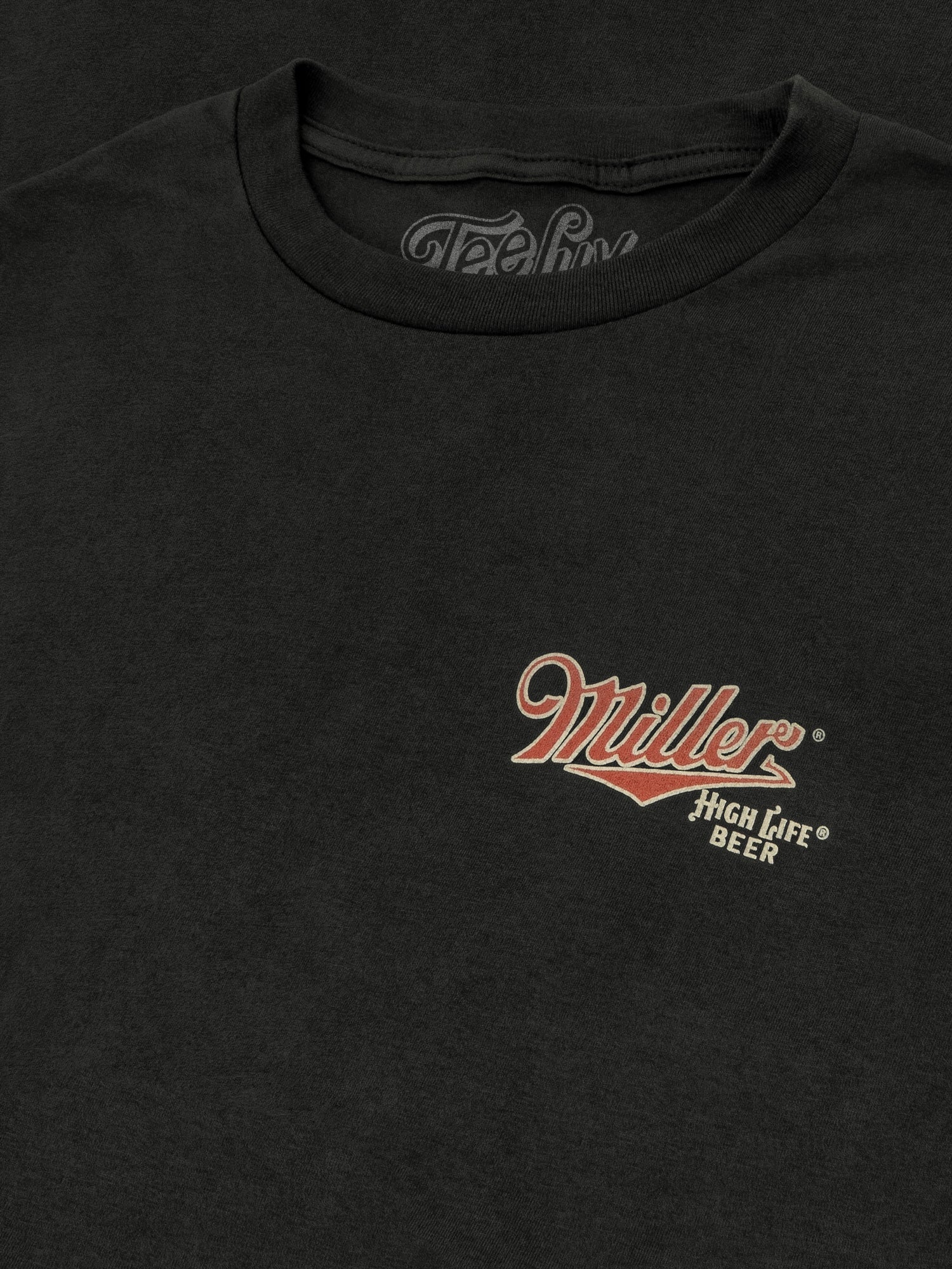 Black t-shirt with Miller High Life Beer logo on a dark background