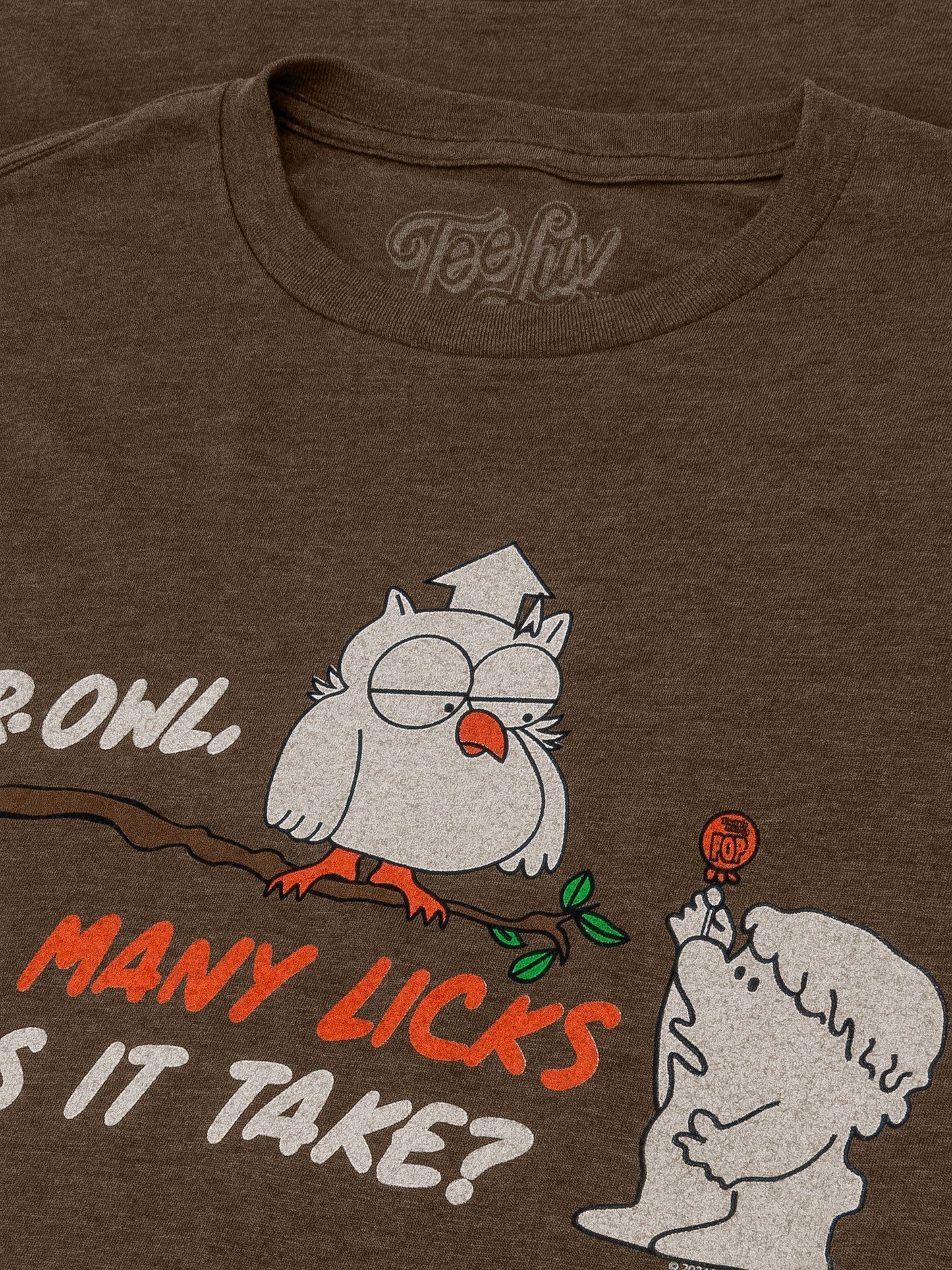 Brown t-shirt with cartoon owl and dog design and 'Teefury' branding.