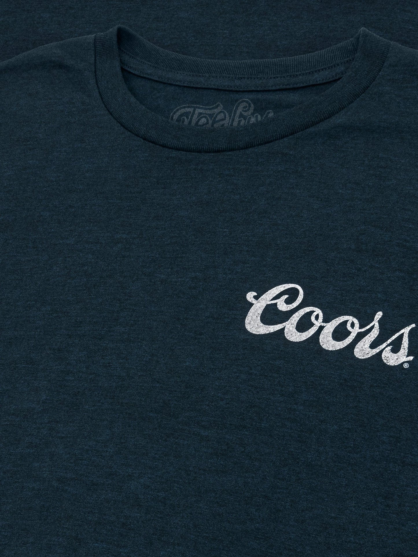 Navy blue t-shirt with 'Coors' logo on a dark background