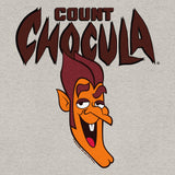Cartoon character with spiky hair and orange face on a gray background with 'COUNT CHOCULA' text.