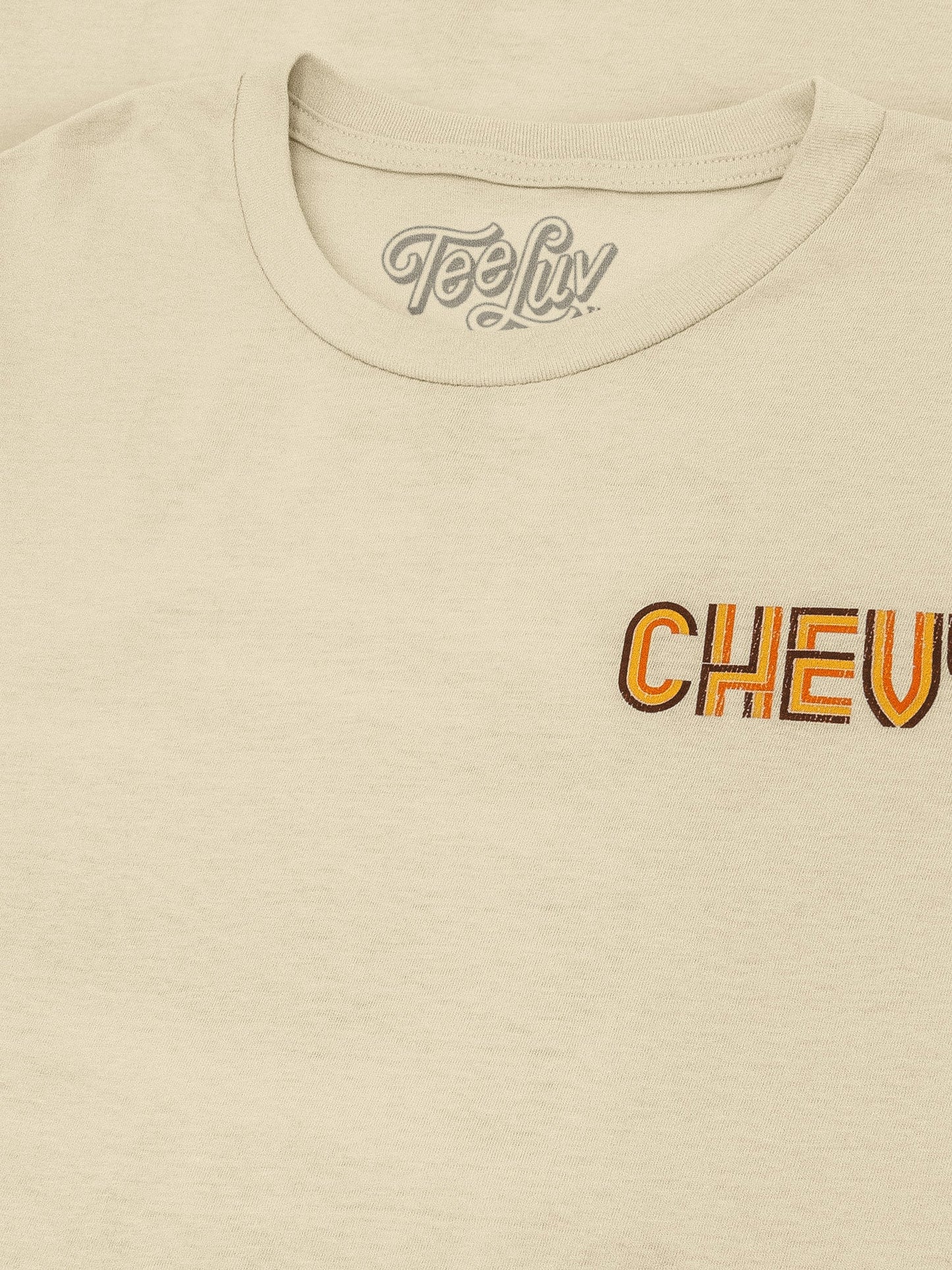 Beige t-shirt with 'Chevy' logo and 'Teely' branding on a beige background
