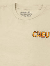 Beige t-shirt with 'Chevy' logo and 'Teely' branding on a beige background