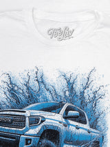 White t-shirt with a Toyota truck graphic and 'Tee Luv' branding.