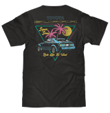 Black t-shirt with Toyota graphic design featuring a car and palm trees on a white background
