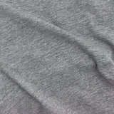 Close-up of gray fabric with folds