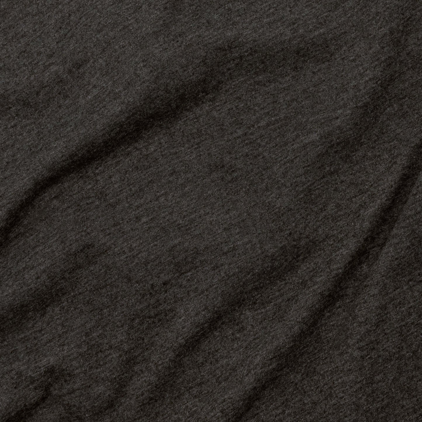 Close-up of dark gray fabric with visible texture