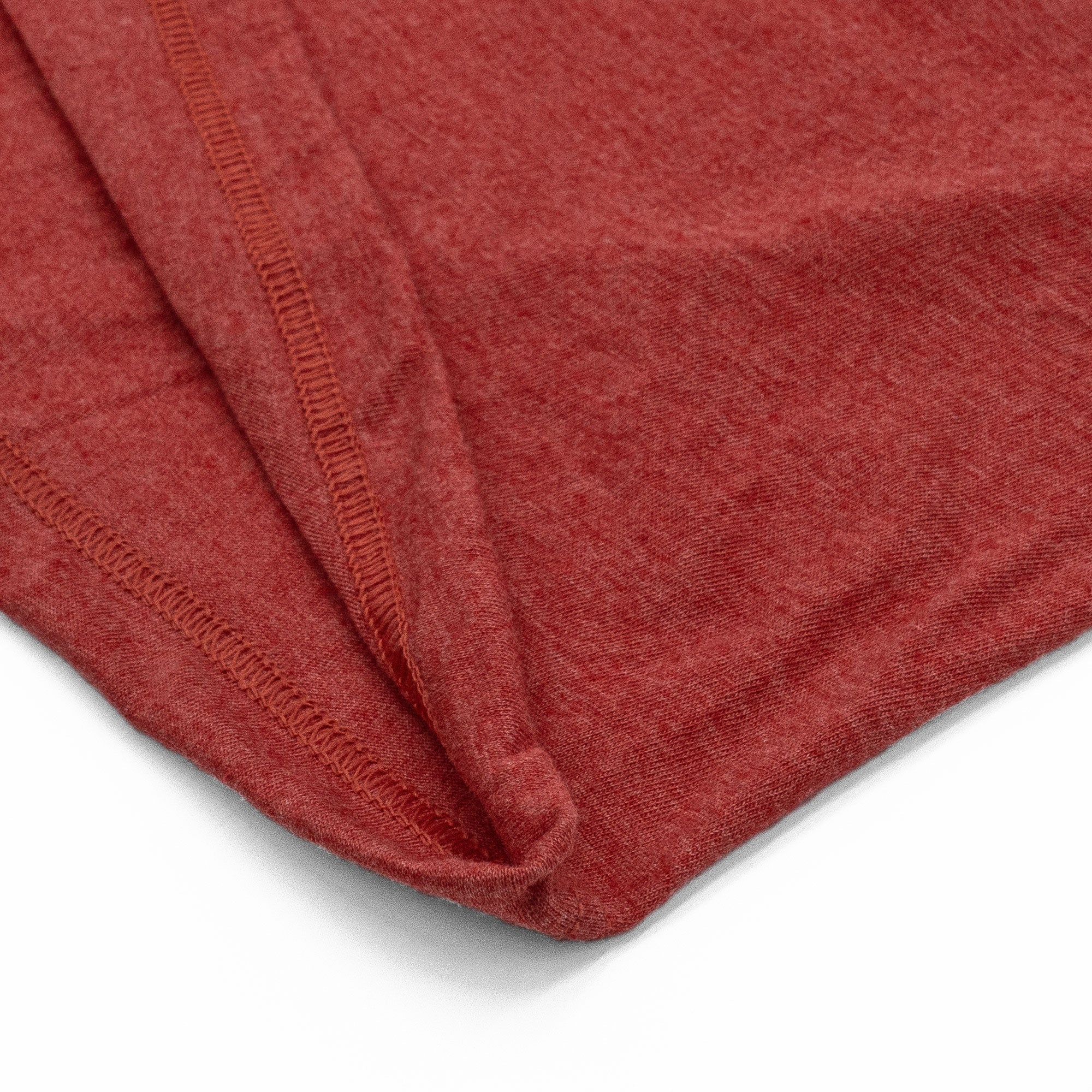 Close-up of a red fabric texture on a white background