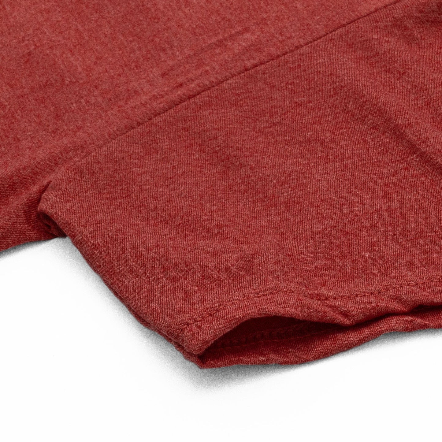 Close-up of a red fabric texture on a white background