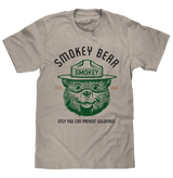 Beige t-shirt with Smokey Bear graphic and text on a white background