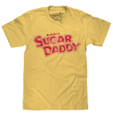 Yellow t-shirt with red and white text 'Delicious Sugar Daddy' on a white background